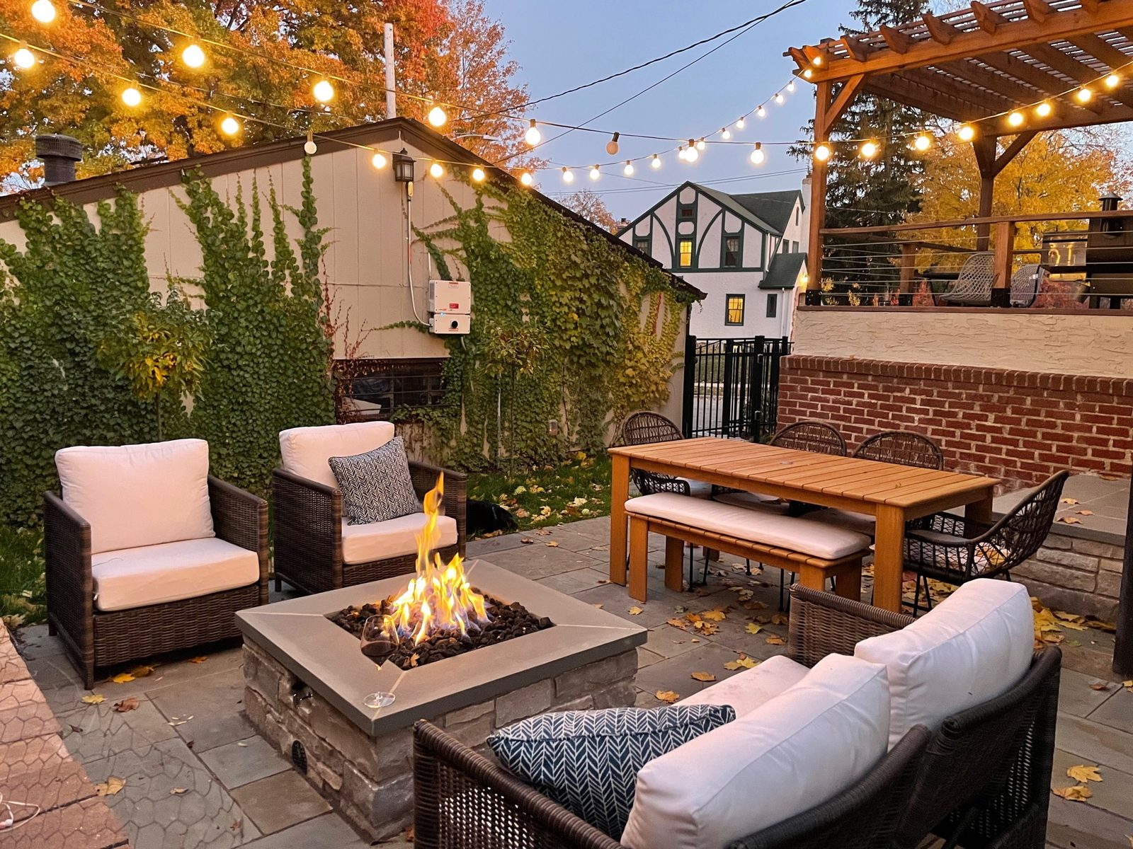 Stone patio with pergola and gas fire pit